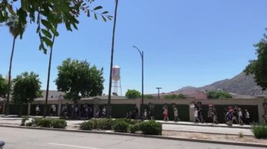 Burbank, CA, USA - 07-19-2023: WGA ve SAG-AFTRA Strikers Picketing on Sidewalk on Warner Brothers Studios, WB Water Tower view on W Olive Ave, 91505.