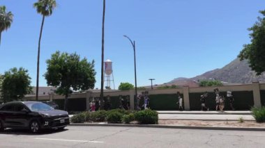 Burbank, CA, USA - 07-19-2023: WGA ve SAG-AFTRA Strikers Picketing on Sidewalk Warner Brothers Studios, WB Water Tower Viable on W Olive Ave, 91505.
