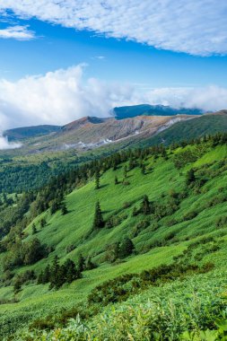 Spectacular view of Mt. Shirane in summer from Shibu Pass, Shiga Kogen. clipart