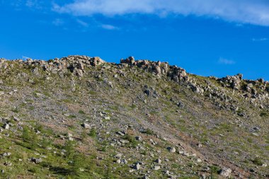 Scenery of rocky mountains at the southern foot of Mt. Kusatsu-Shirane. clipart