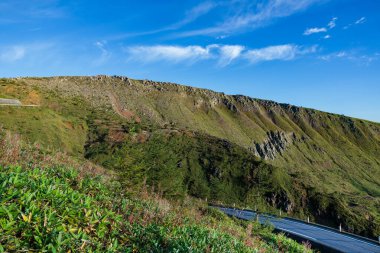 Majestic scenery at the southern foot of Mt. Kusatsu-Shirane in summer. clipart