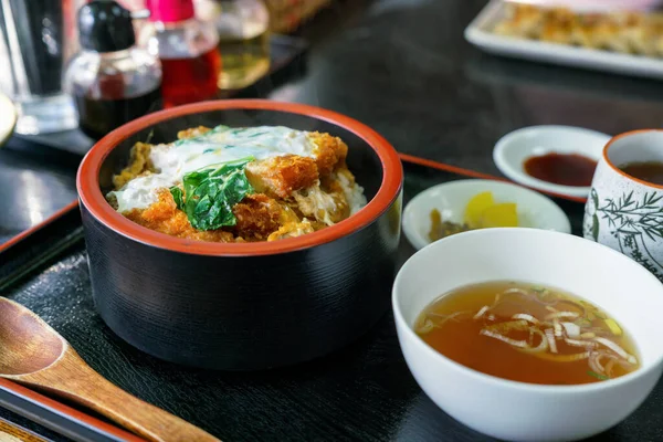 stock image Katsudon is a bowl of rice, with a topping of deep-fried pork.