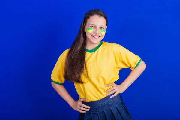 stock image young girl, soccer fan from Brazil. hands on waist