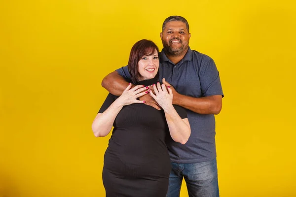 stock image Brazilian couple, Caucasian woman and black man, hugging