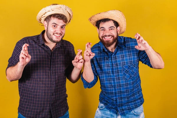 Two Friends Wearing Typical Clothes Festa Junina Fingers Crossed Twisting — Stock Photo, Image