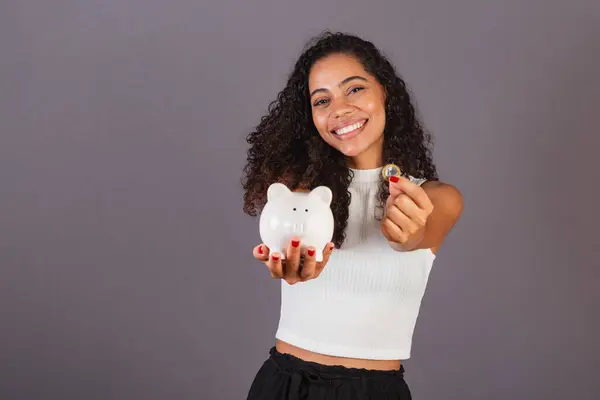 Young Brazilian Black Woman Holding Piggy Bank Economy Finance Retirement — Stock Photo, Image