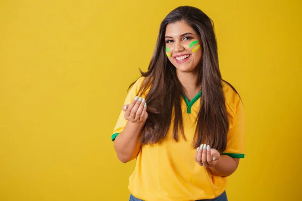 stock image Woman supporter of Brazil, world cup 2022, football championship, calling with your hands, come here, welcome.