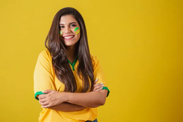 stock image Woman supporter of Brazil, world cup 2022, football championship, Arms crossed, smiling.