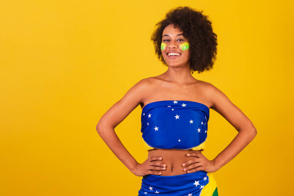 young black woman brazilian soccer fan. close-up photo