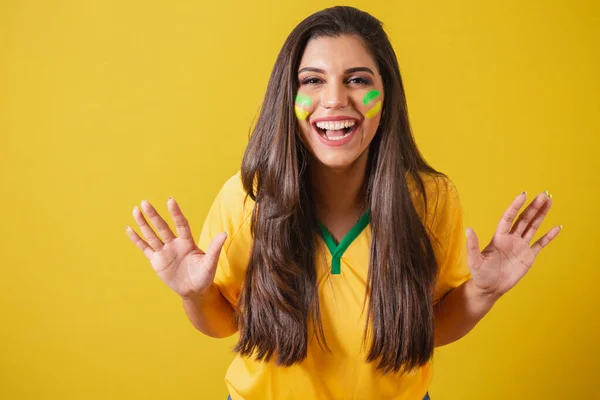 stock image Woman fan of Brazil, world cup 2022, football championship, amazed, wow, incredible, unbelievable, surprised to watch a football match.