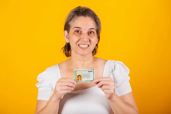 Adult Brazilian Woman Holding Identity Card — Stock Photo, Image