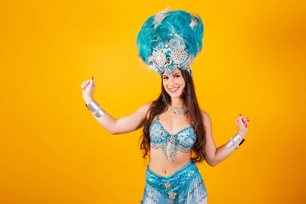 stock image beautiful brazilian woman with queen clothes from samba school, carnival. Crown of feathers, dancing.