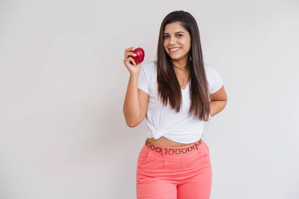 Beautiful Brazilian Woman White Shirt Pink Pants Advertising Photo Eating — Stock Photo, Image