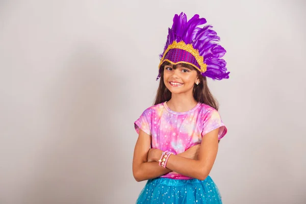 stock image Beautiful Brazilian girl, child, dressed for carnival in Brazil. crossed arms