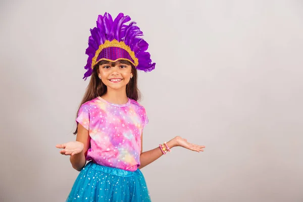 stock image Beautiful Brazilian girl, child, dressed for carnival in Brazil. Open arms welcome.