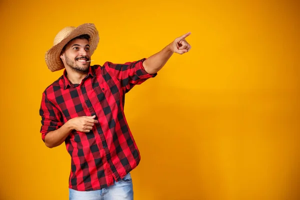 Brazilian Man Wearing Typical Clothes Festa Junina Pointing Side Space — Stock Photo, Image