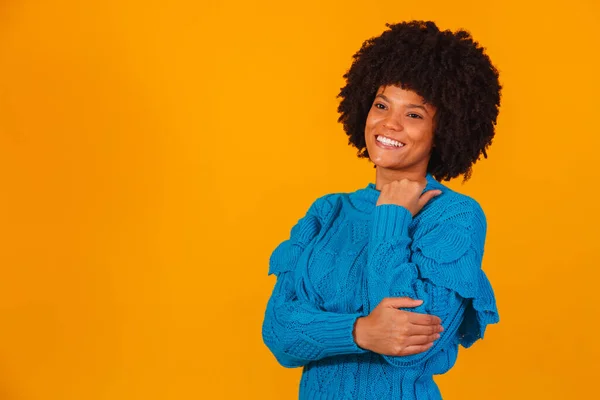 stock image afro woman dressed for winter