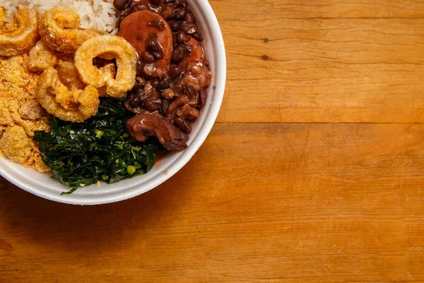 Feijoada, the Brazilian cuisine tradition.Delicious dish made of feijoada with crackling