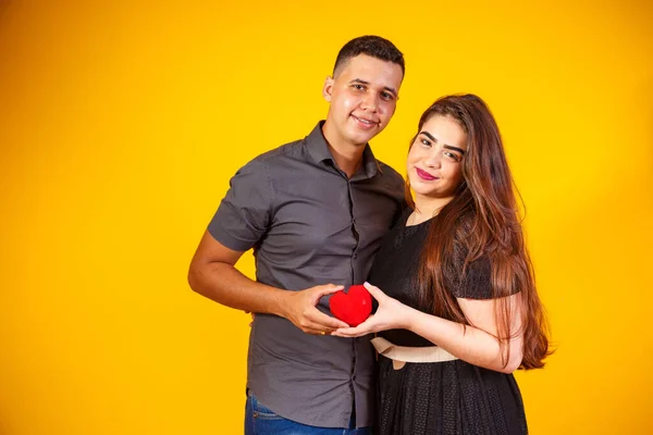 Young Valentine Couple Holding Heart Shaped Chocolate Couple Holding Heart Stock Picture