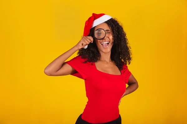 Woman Dressed Christmas Santa Hat Wearing Magnifying Glass — Stock Photo, Image