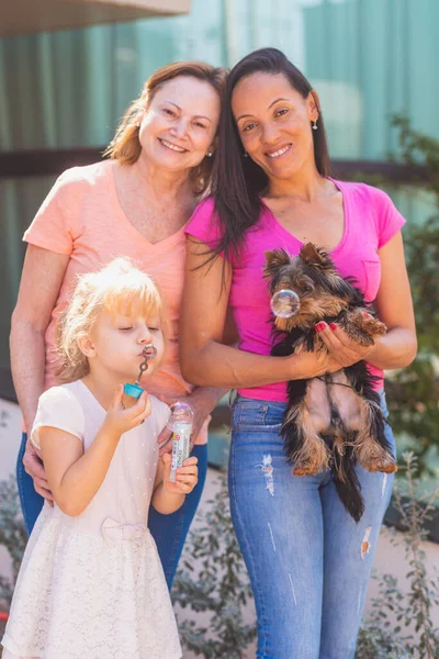 Smiling Lesbian Couple Child Pet Puppy Lesbian Couple Holding Adoptive — Stock Photo, Image