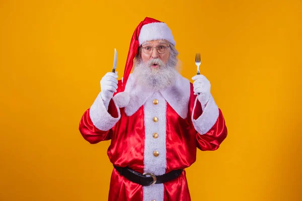 Санта Клаус Держит Нож Вилку — стоковое фото