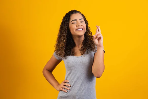 Afro Woman Fingers Crossed Cheering Victory — Stock Photo, Image
