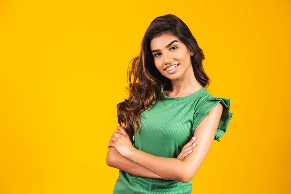 Young Smiling Girl Arms Crossed Yellow Background — Stock Photo, Image