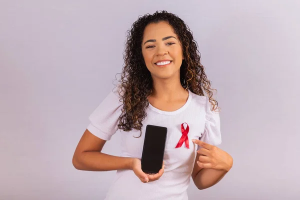 Concept World Aids Day Young Woman Holds Smartphone Blank Screen — Stock Photo, Image