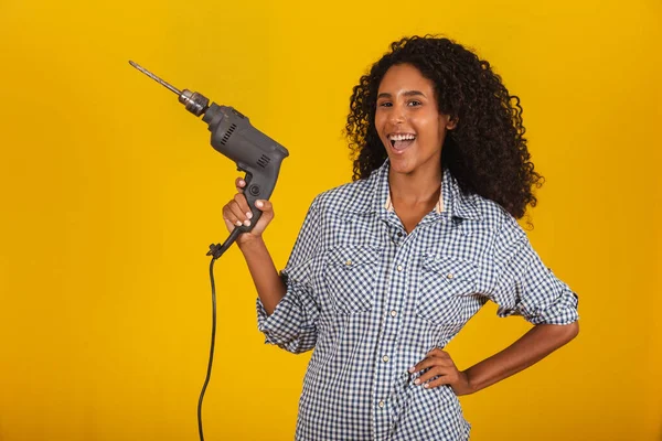 Contractor Woman Drill Yellow Background — Stock Photo, Image