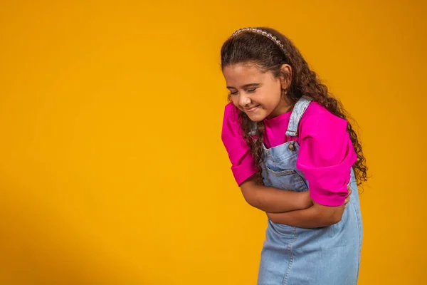 Girl Yellow Background Has Stomachache Holding Hands Belly Suffering — Stock Photo, Image