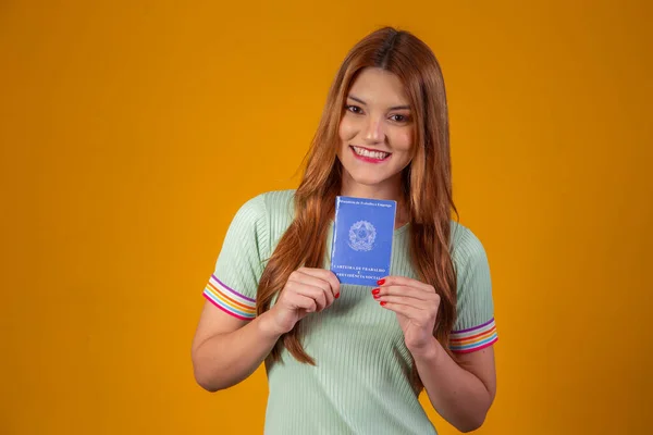 Brazilian redhair woman with document work and social security, (Work Card and Social Security)