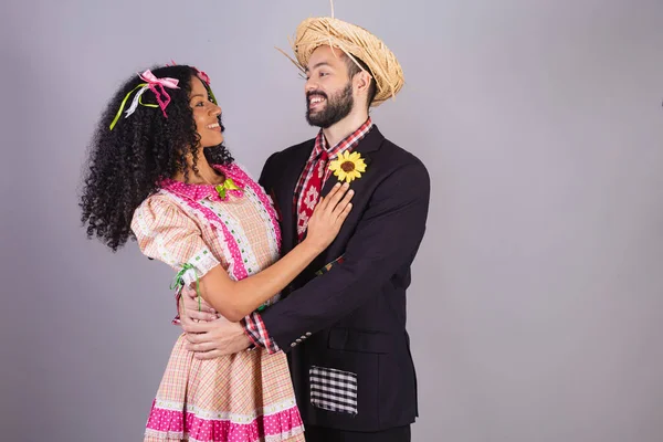 stock image Couple wearing typical clothes of Festa Junina, Arraial, Festa de So Joo. embraced. 