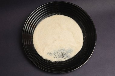 wheat, fine wheat bran, plate, black background clipart