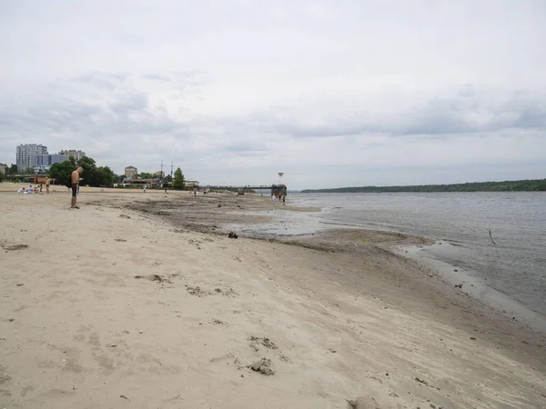 stock image Zaporizhzhia, Ukraine - June 10, 2023: The destruction of the Kakhovka dam led to a catastrophic decrease in the water level in the Dnipro river. A huge environmental disaster is coming