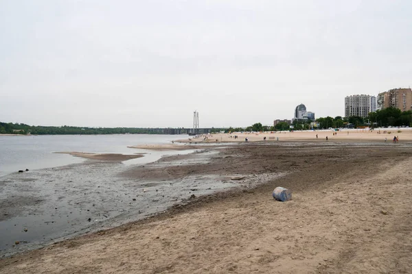 stock image Zaporizhzhia, Ukraine - June 10, 2023: The destruction of the Kakhovka dam led to a catastrophic decrease in the water level in the Dnipro river. A huge environmental disaster is coming