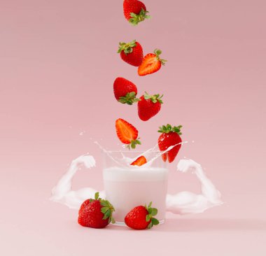 Çileklerden oluşan yaratıcı bir düzen. Çilek tadı ve pastel pembe arka planda sütten yapılmış kol kasları olan süt bardağına dökülüyor. En az smoothie veya milkshake konsepti.