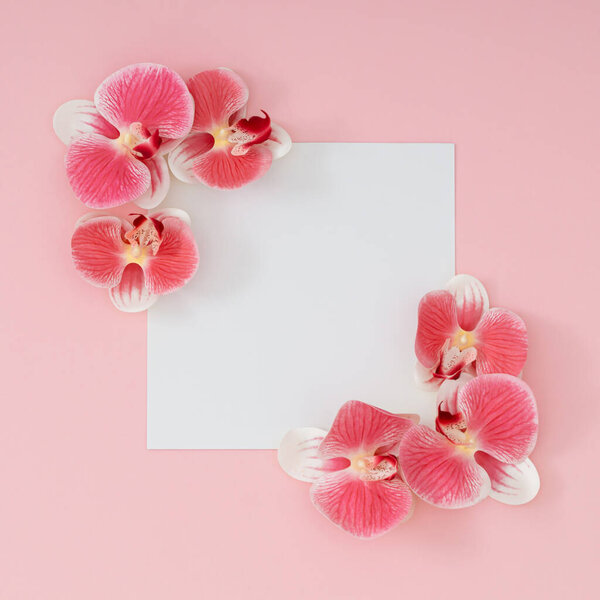 Trendy spring and summer composition made with beautiful pink and white orchid flowers and paper card note copy space on light pastel pink background. Minimal concept. Flat lay.
