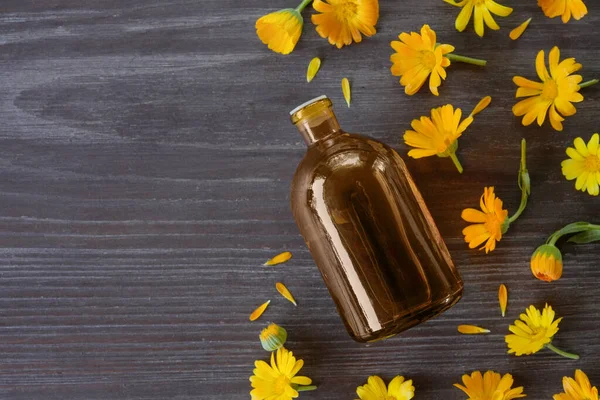 Calendula Oil Glass Bottle Old Table Closeup Top View Flat — Stock Photo, Image