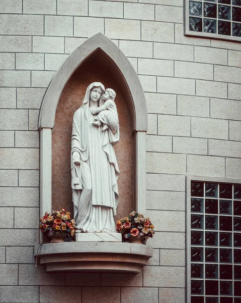 stock image Nazareth, Israel - August 16, 2021: Statue of Virgin Mary with Baby Jesus, Franciscan Sisters of IHM School in Nazareth, Israel. High quality photo