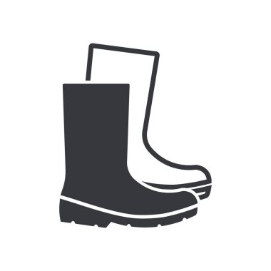 Siyah güvenlik botlarının izole edilmiş çizmeleri, çeşitli iş ortamlarında temel güvenlik teçhizatı olarak kullanılan koruyucu ayakkabıları sembolize ediyor