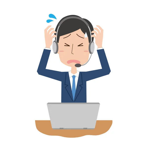 Çağrı merkezinde başı dertte olan bir erkek çalışanın resmi