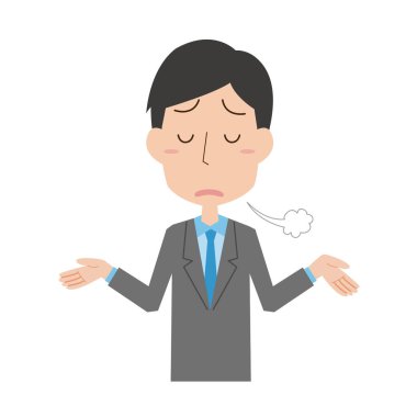 Erkek bir ofis çalışanı iç çekiyor.