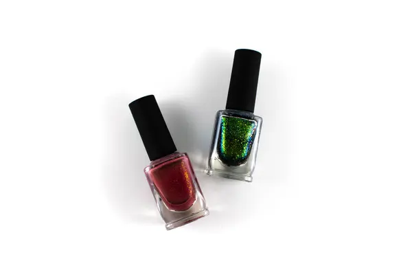 Background flat lay photo with multiple colors of nail polish