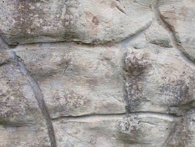 Dokulu bir duvarın dokusu. Duvar gri bir taş gibi stilize edilmiş..