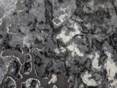 Gri benekli kumaş dokusu. Grinin farklı tonlarından gelen arkaplan.