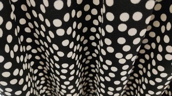 texture background, pattern. black fabric. silk fabric with dots. this white background.. design and crunchy weave as it. perfect for fabric