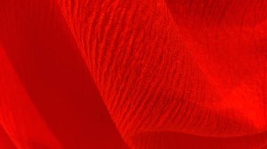 Kırmızı ipek kumaş. Soyut kırmızı ipek kumaş dokusu. tasarım için arkaplan