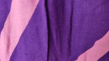 Kumaş dokusunun arka planı. pembe ve mavi renk.