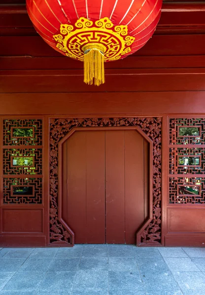 stock image Classic buddhist temple style red door and ceiling hanging round dome in Montreal